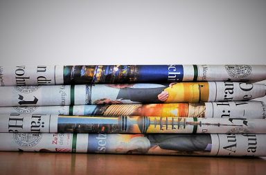 Newspaper tack on table