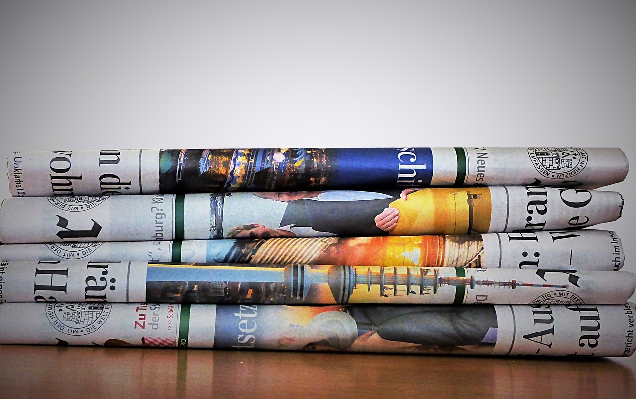 Newspaper tack on table