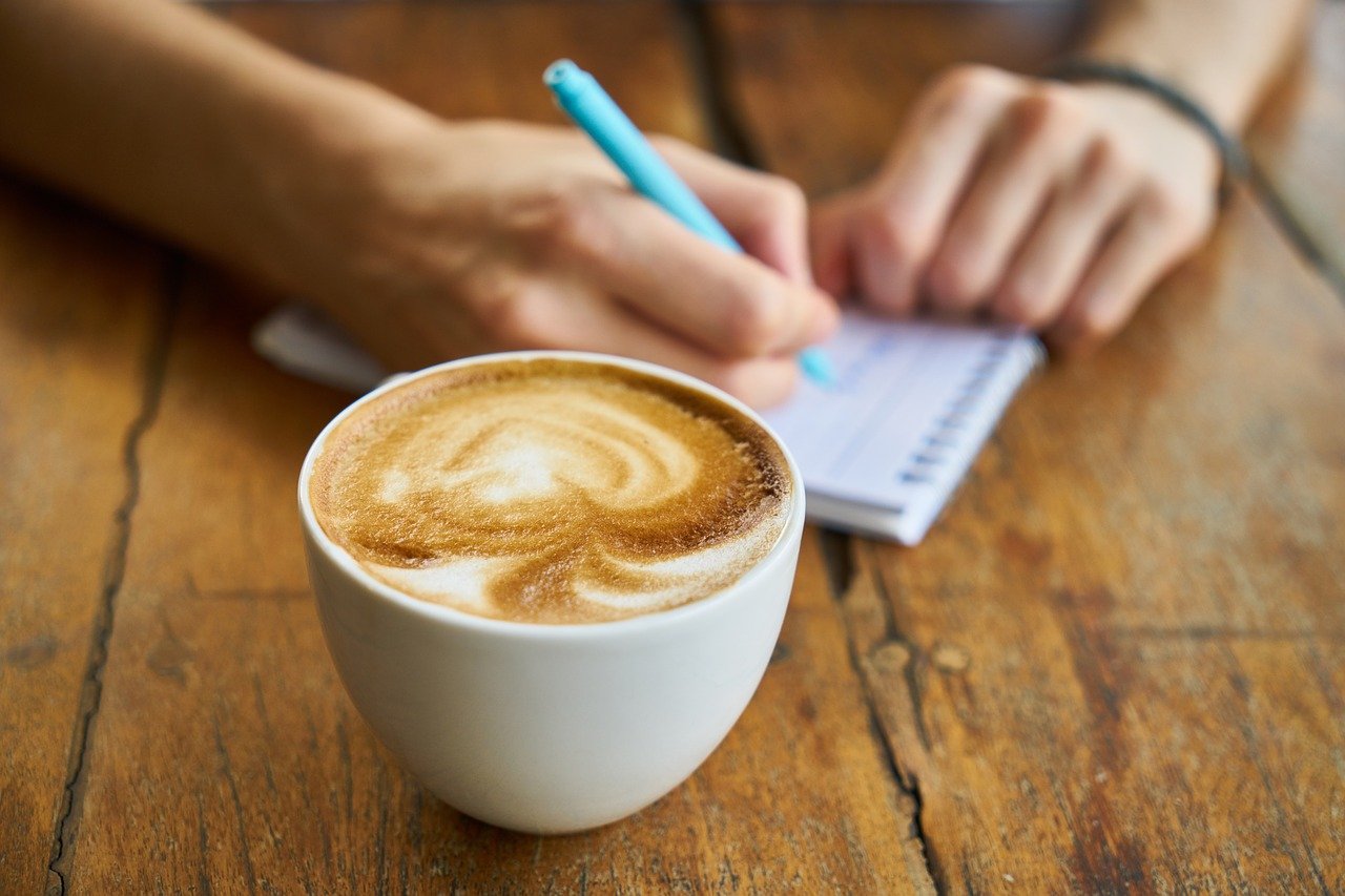 coffee cup and notepad