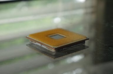 brown and black book on glass table