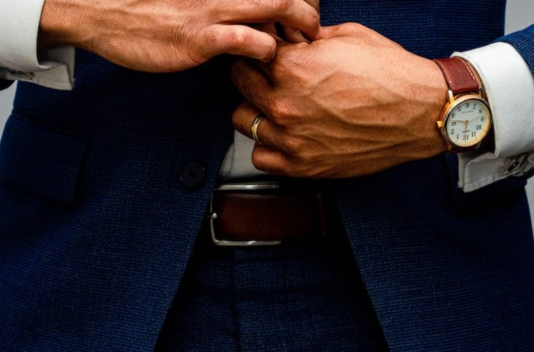man in blue suit jacket and white dress shirt