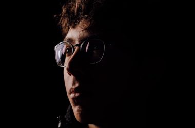 man in black framed eyeglasses